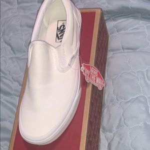 New never been  worn all white slip on vans